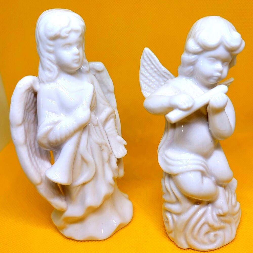2 Different White Porcelain Musical Angels With Wings 1 with Flute 1 With Horn